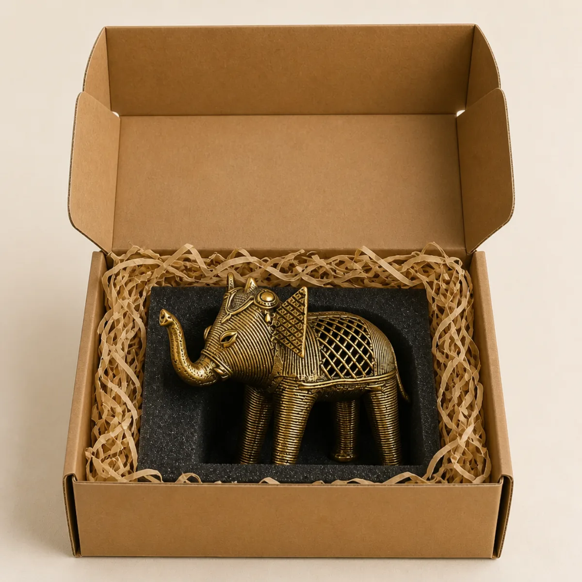 Dhokra brass elephant packed in a kraft gift box with foam for export