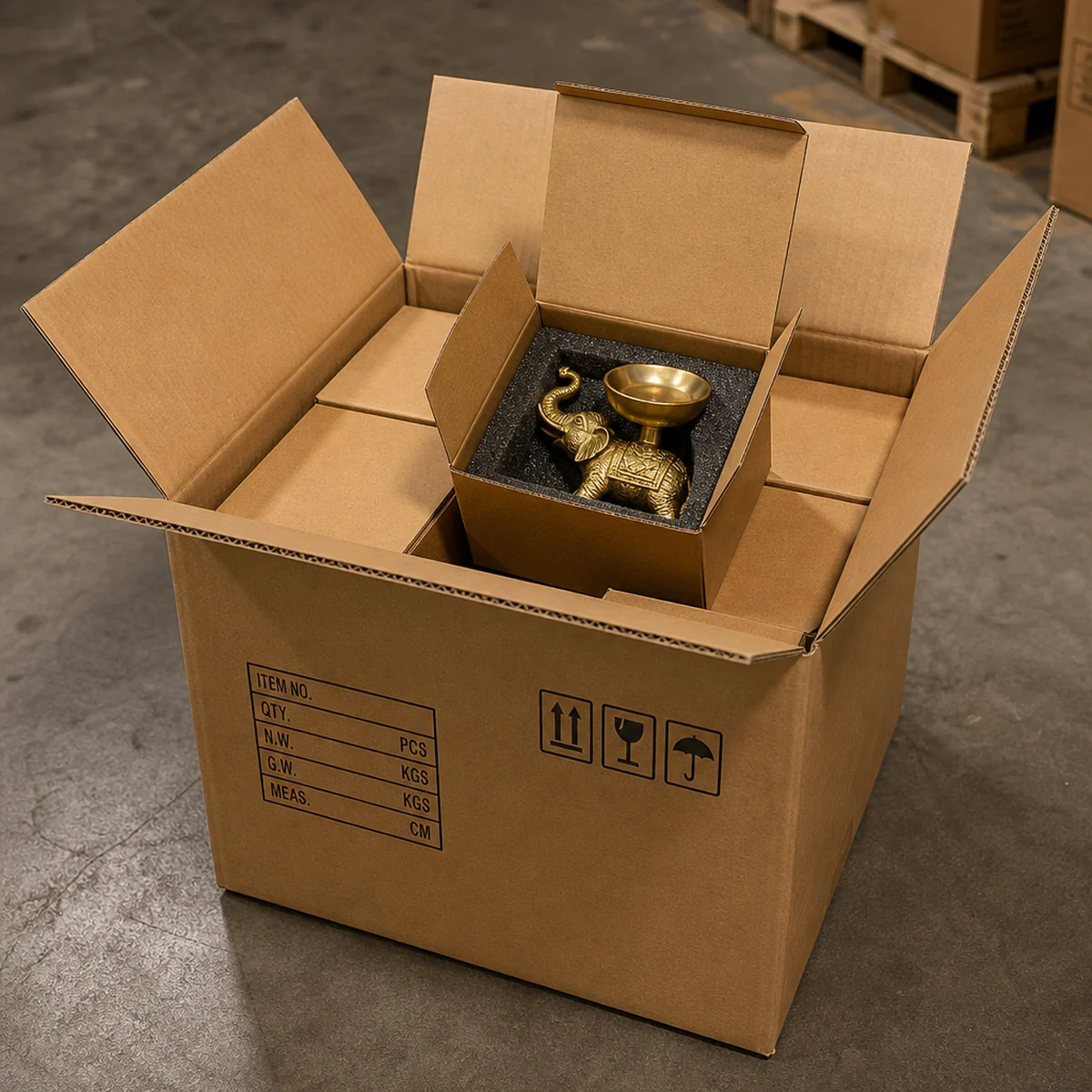 Altus Exports shipping carton with inner gift boxes of brass elephant candle holders from India