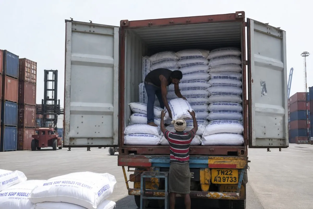 20-foot shipping container being stuffed with soap noodle bags at Indian export port